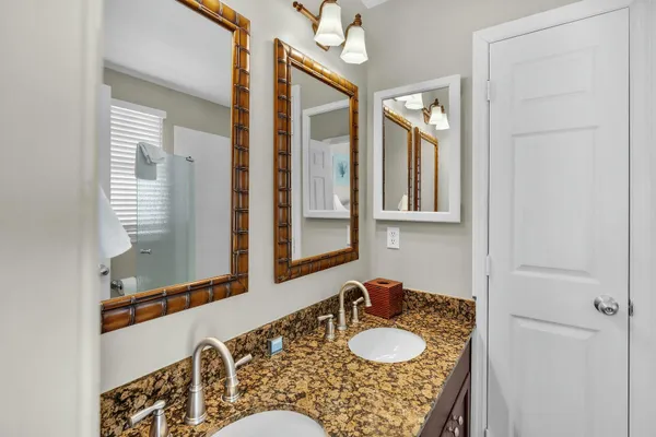 a view of a balcony with wooden floor