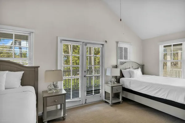 a view of a house with a yard and plants