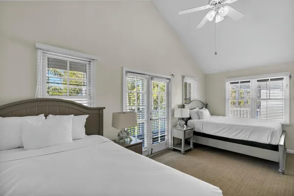 an aerial view of a house with a lake view