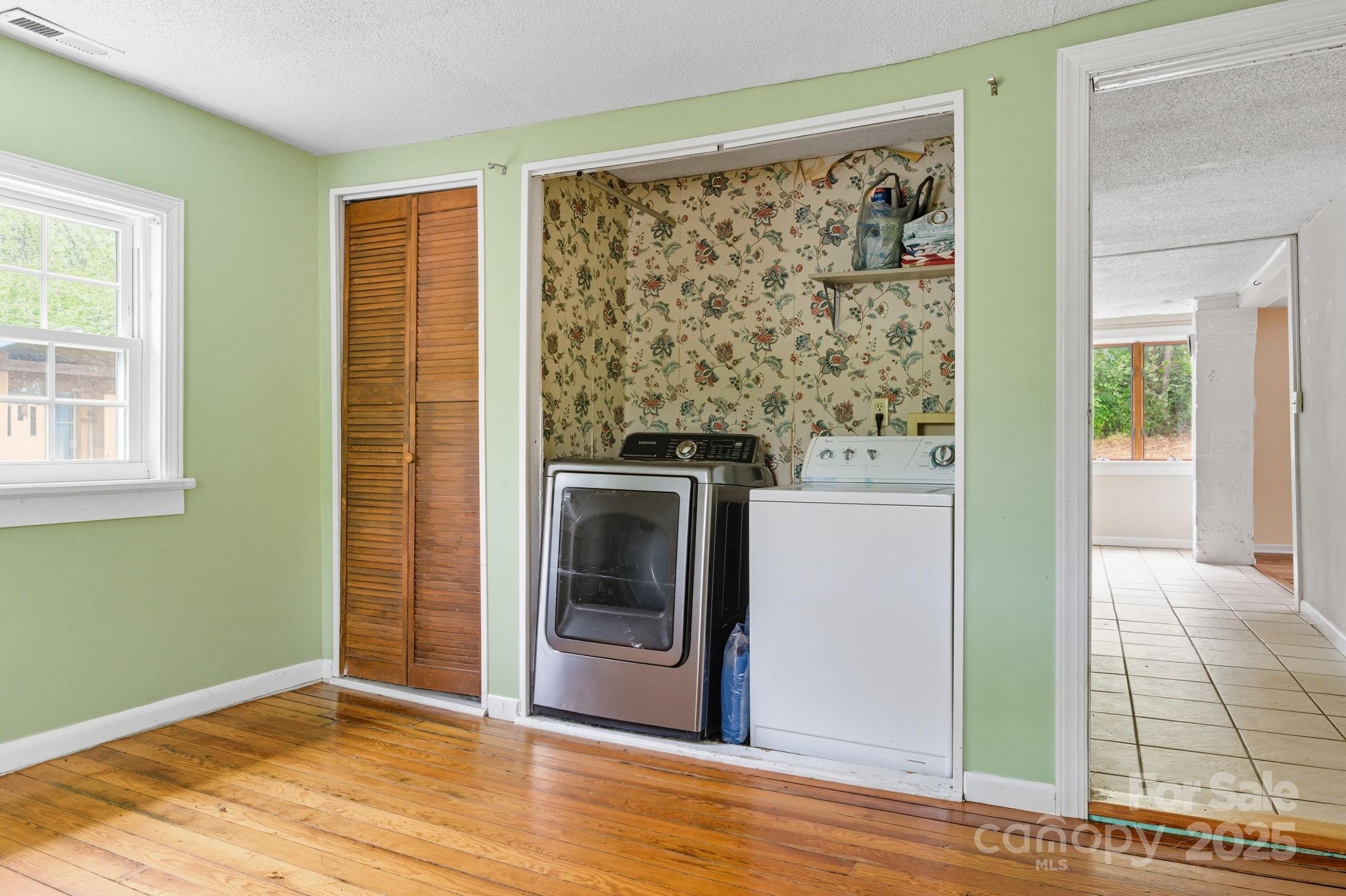 132 Little Knob Road Asheville, NC 28803 - Photo 13 of 18 a view of a kitchen with washer and dryer
