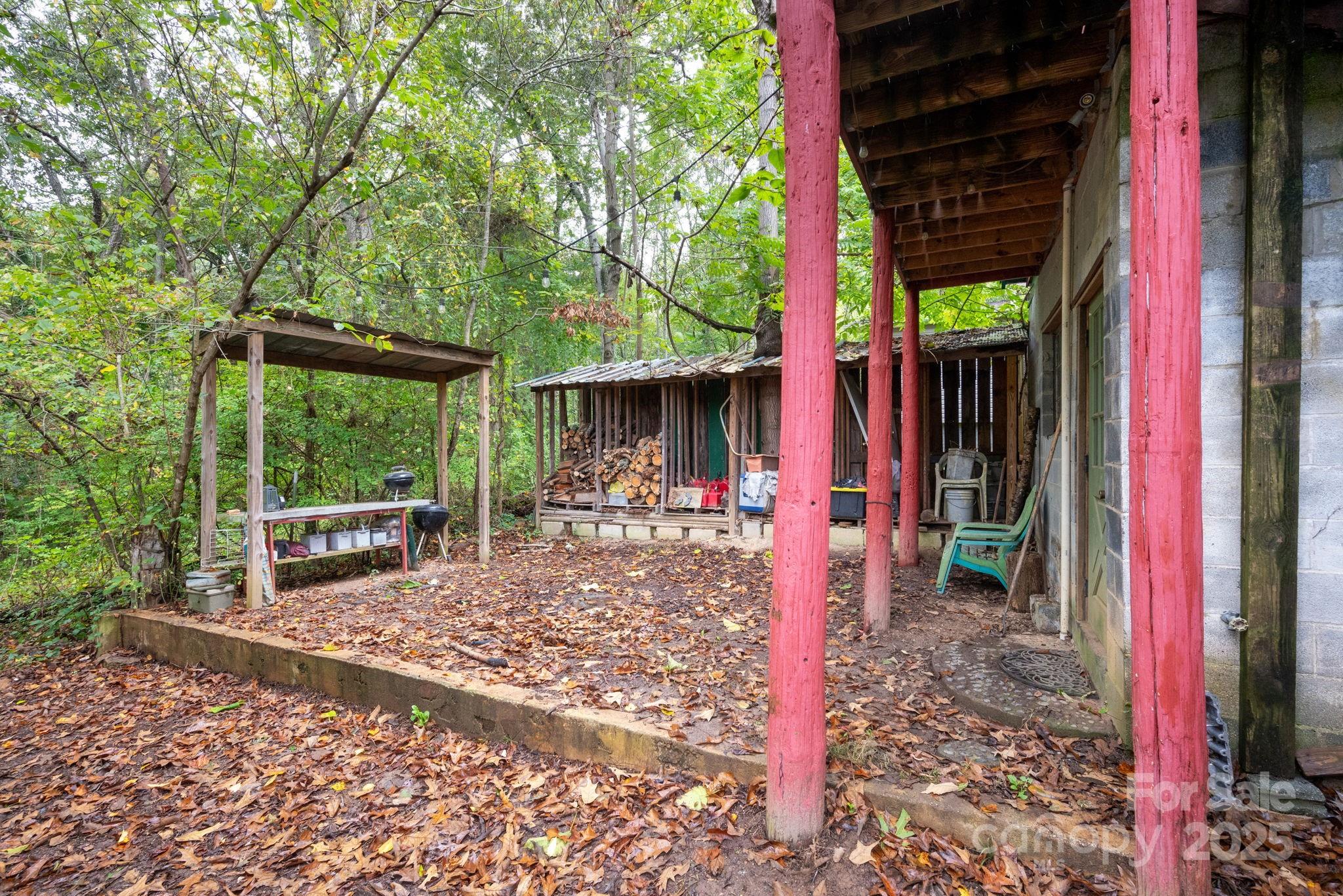 132 Little Knob Road Asheville, NC 28803 - Photo 15 of 18 a view of a house with backyard and porch