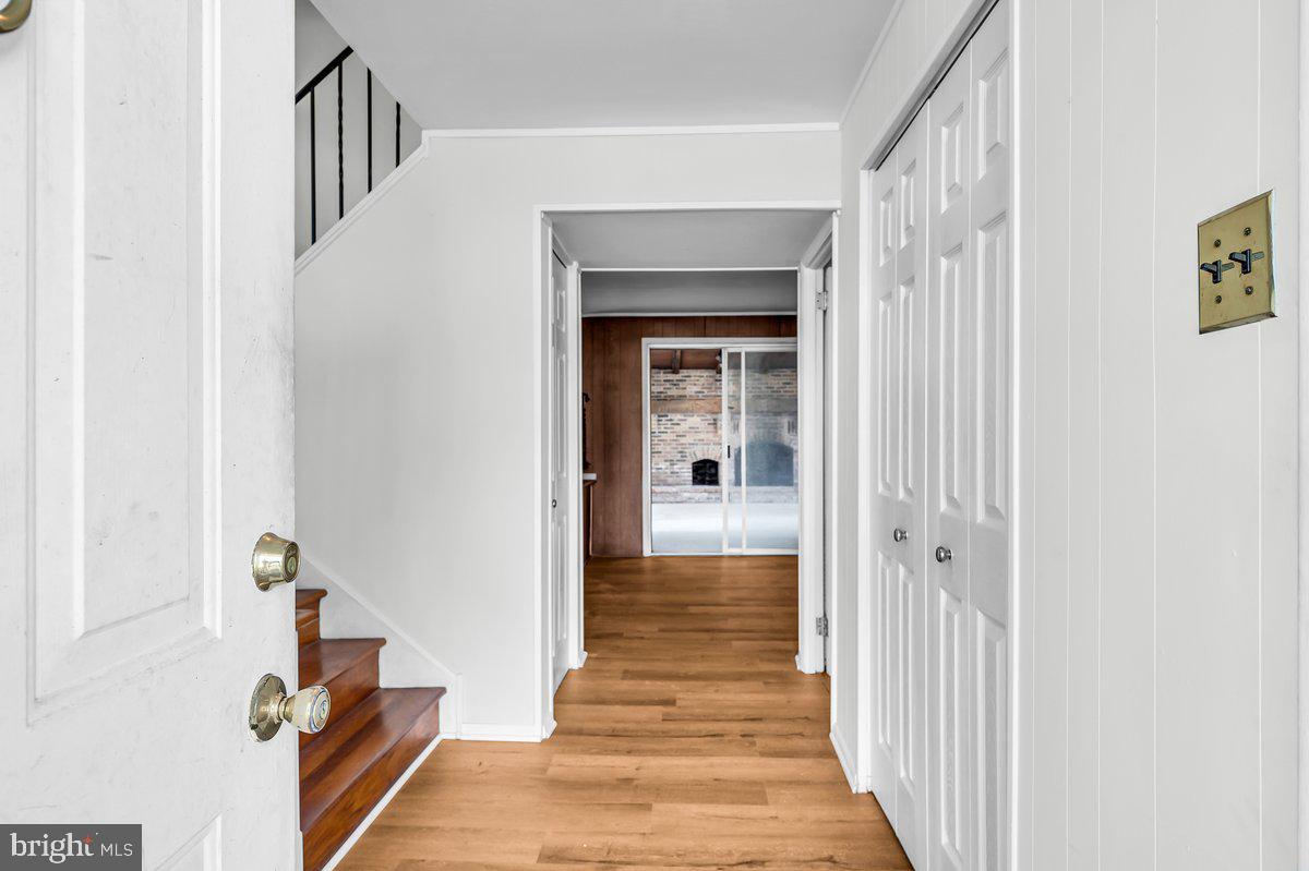 1216 Grayrock Road Newark, DE 19713 - Photo 5 of 28 a view of a hallway with wooden floor and entryway