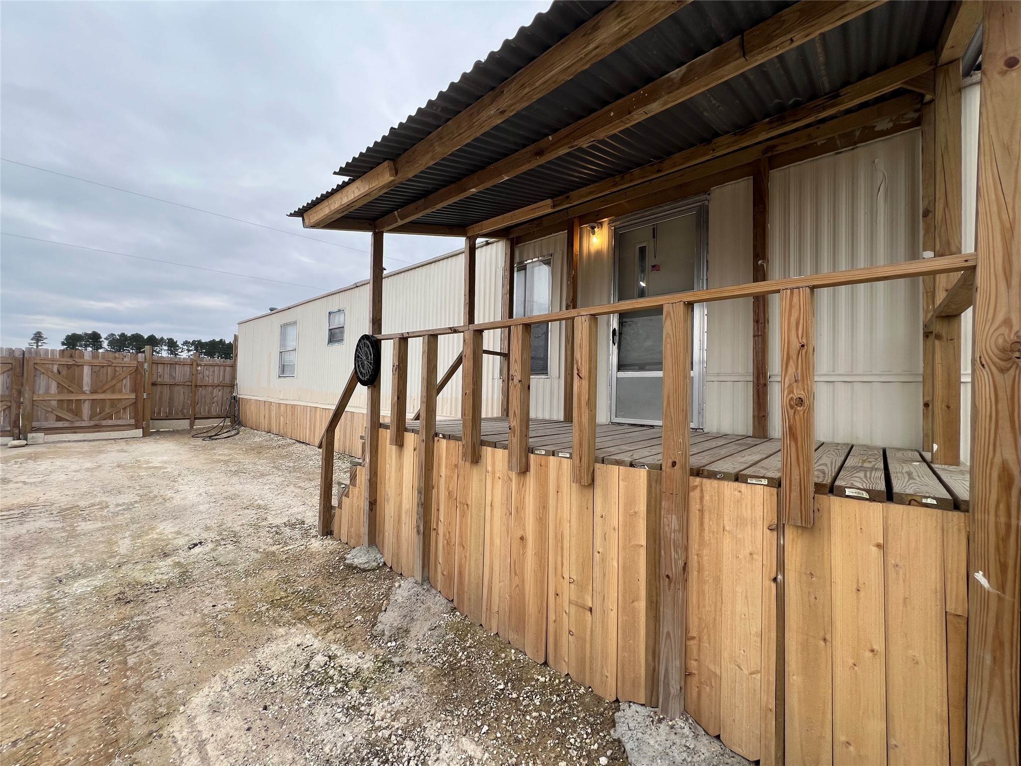 a view of staircase with wooden floor and fence