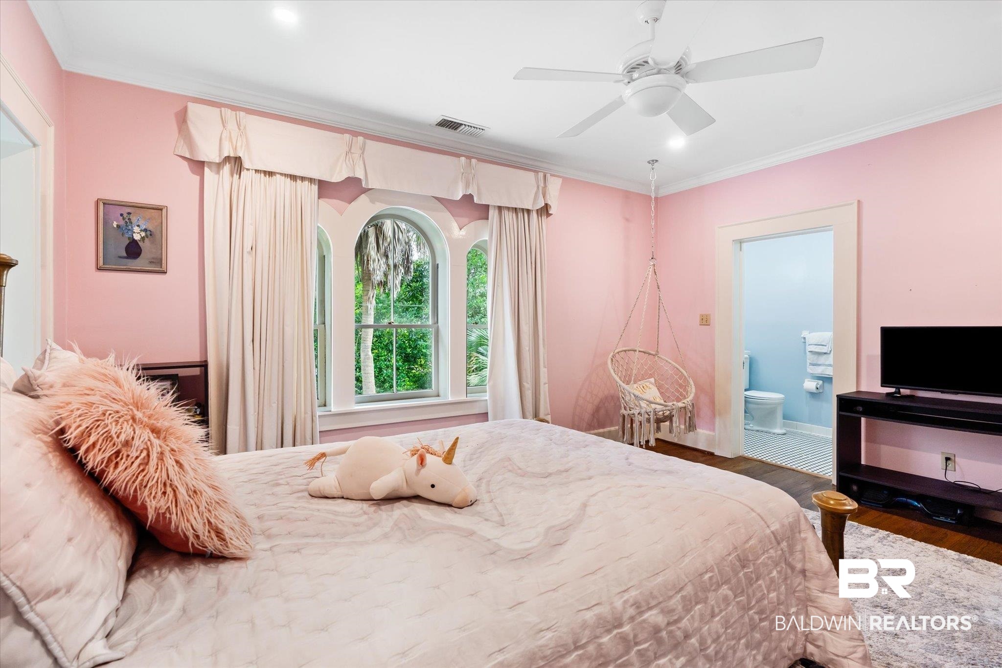 2205 Spring Hill Avenue Mobile, AL 36607 - Photo 32 of 59 Bedroom featuring ensuite bathroom, ceiling fan, dark hardwood / wood-style floors, and crown molding