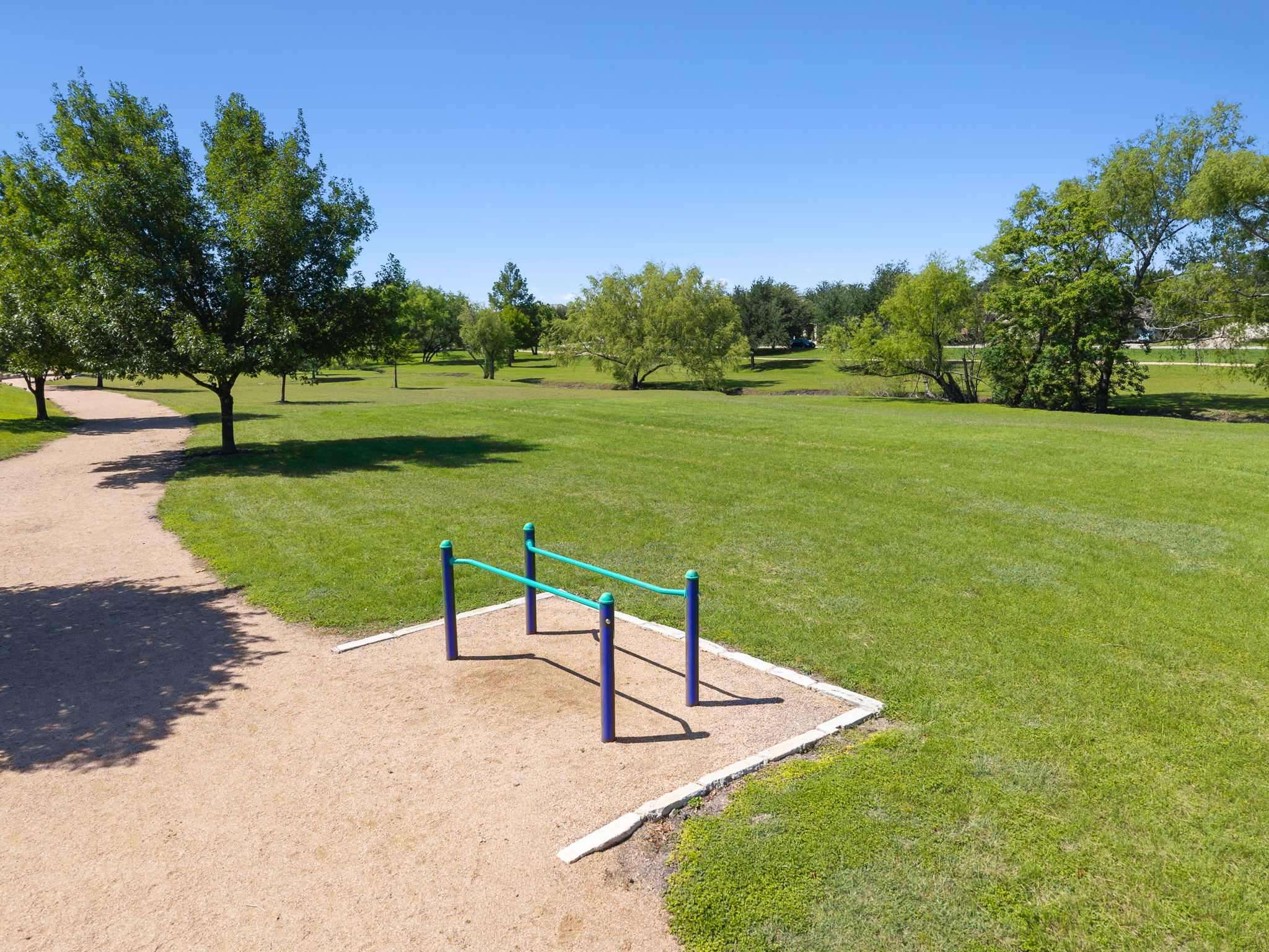 3101 Fresh Spring Road Pflugerville, TX 78660 - Photo 35 of 39 Outdoor fitness equipment dots the expansive trail system making that morning walk potentially even more invigorating