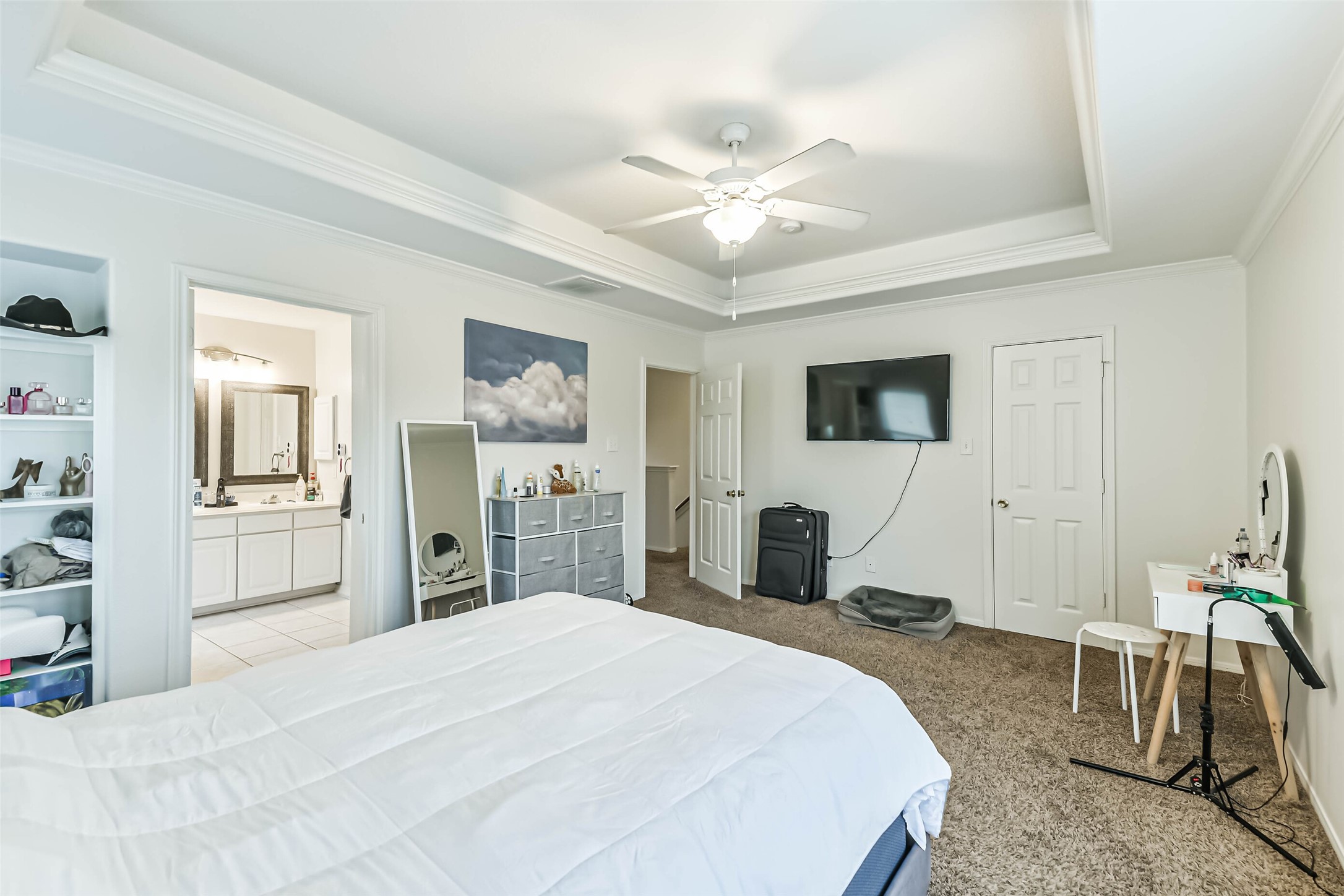 22538 Goss Spring Court Spring, TX 77373 - Photo 24 of 36 a bedroom with a bed and a flat screen tv