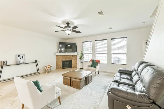 a kitchen with a sink stove and white cabinets