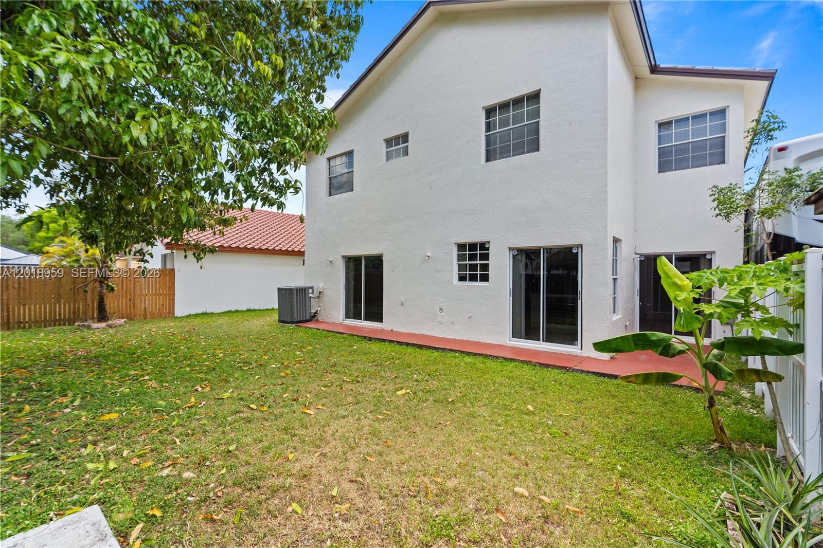 15345 Southwest 63rd Terrace Miami, FL 33193 - Photo 50 of 51 a house with garden in front of it
