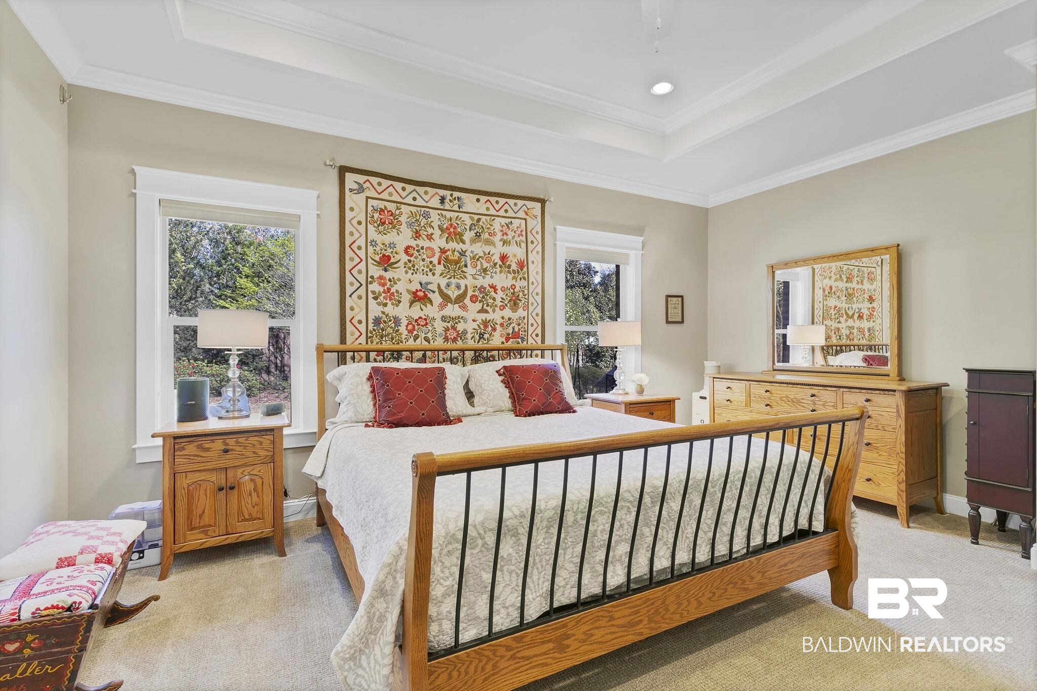 20105 Bunker Loop Fairhope, AL 36532 - Photo 29 of 65 Bedroom with light carpet, crown molding, and a tray ceiling
