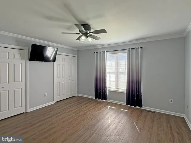 a bathroom with a sink a mirror and a shower