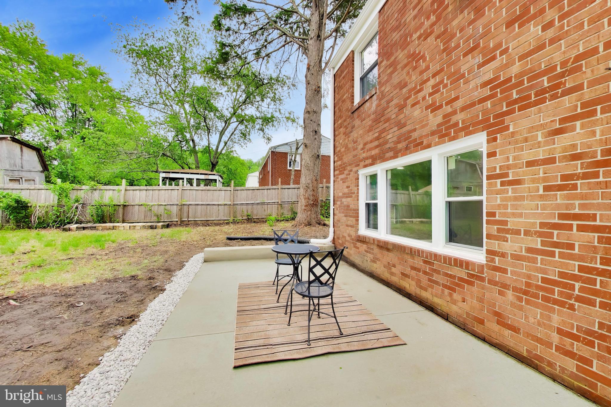 11309 Keystone Avenue Clinton, MD 20735 - Photo 32 of 36 a view of house with backyard and outdoor seating