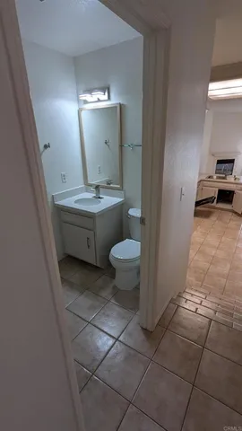 a view of empty room with floor to ceiling window