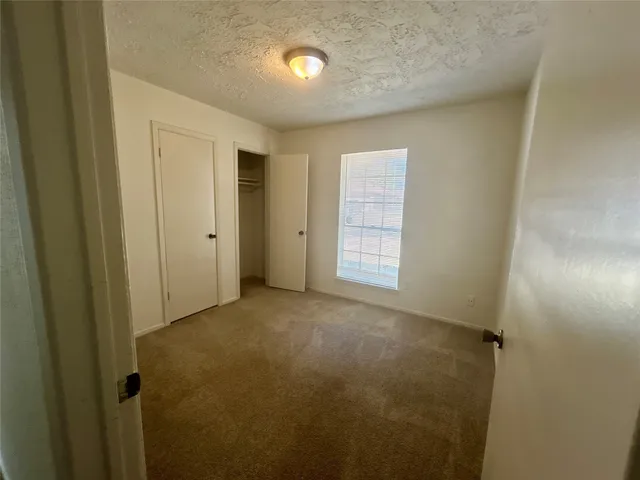 a view of a livingroom with a fireplace