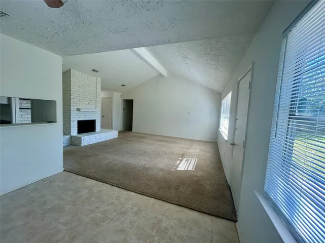 a view of a room with a window