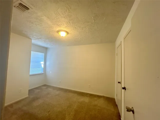a bathroom with a tub and sink