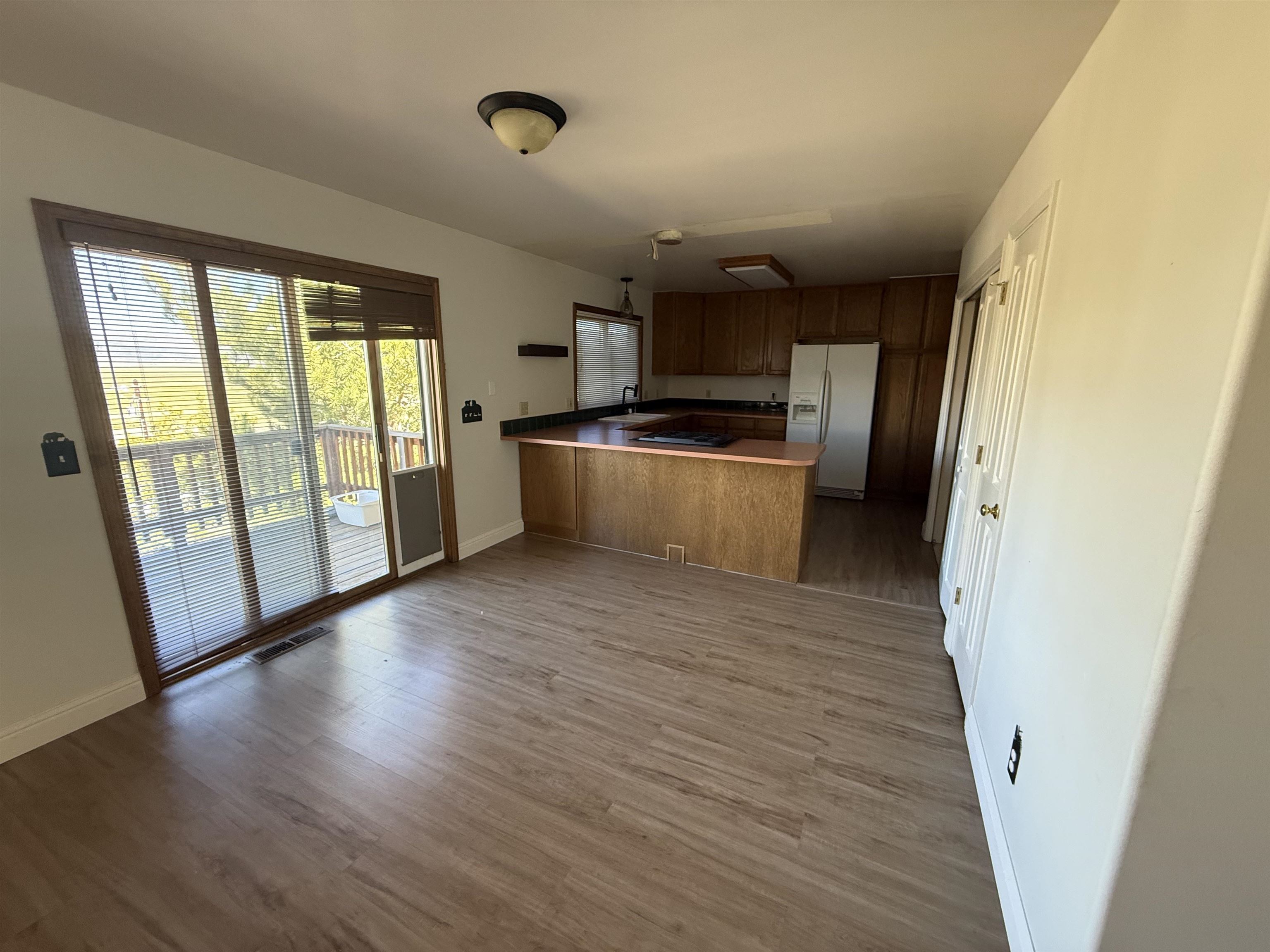 35 Potato Peak Road Bridgeport, CA 93517 - Photo 12 of 21 a view of a kitchen with wooden floor and electronic appliances