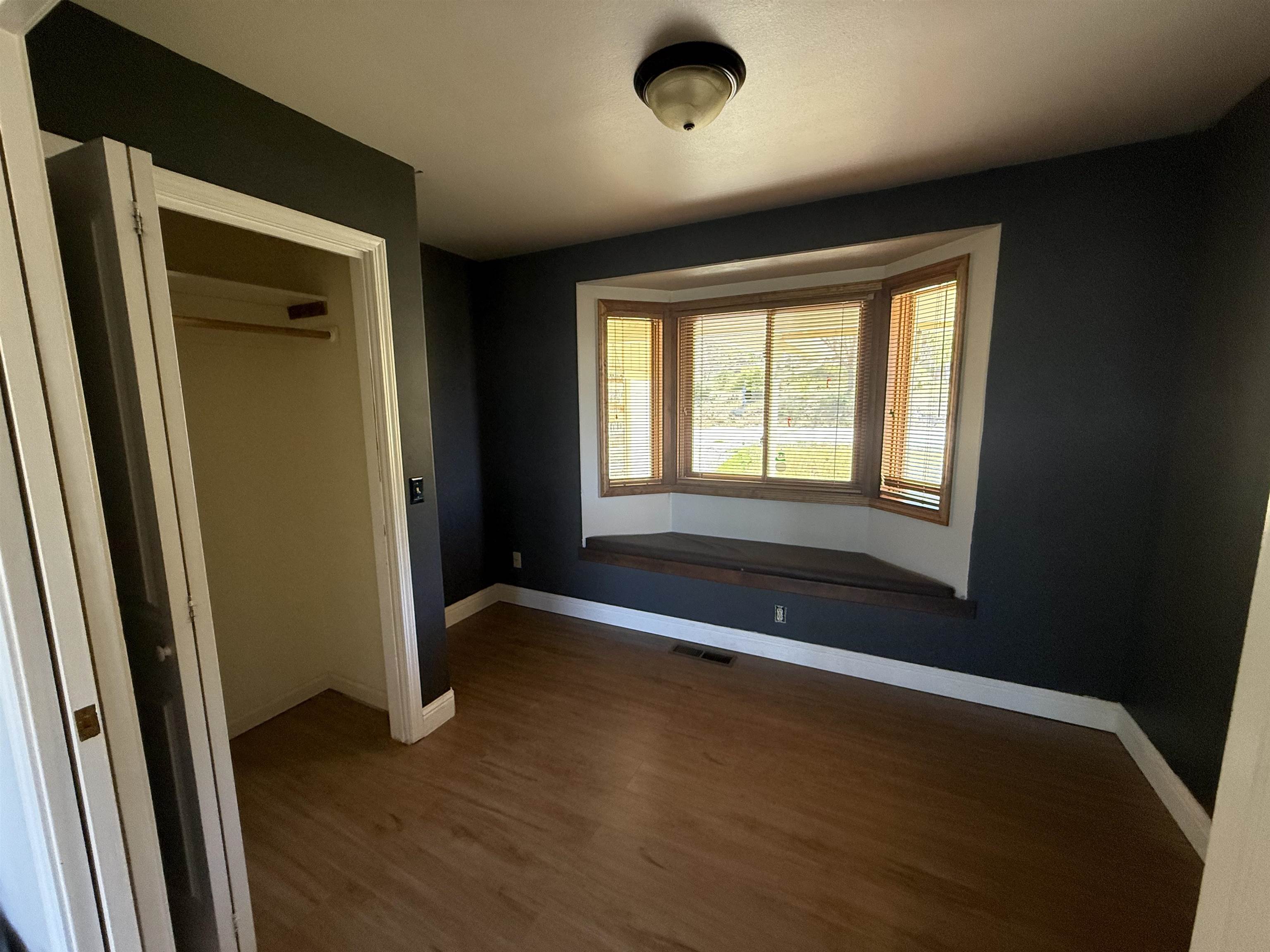 35 Potato Peak Road Bridgeport, CA 93517 - Photo 10 of 21 an empty room with wooden floor and windows