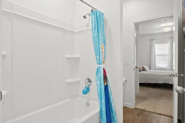 a view of bathroom and tub