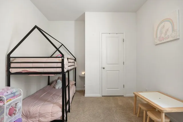 a view of room with furniture and closet