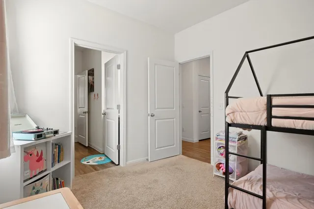 a view of an empty room and workspace