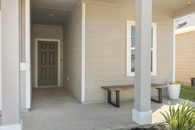 a view of livingroom with furniture and window