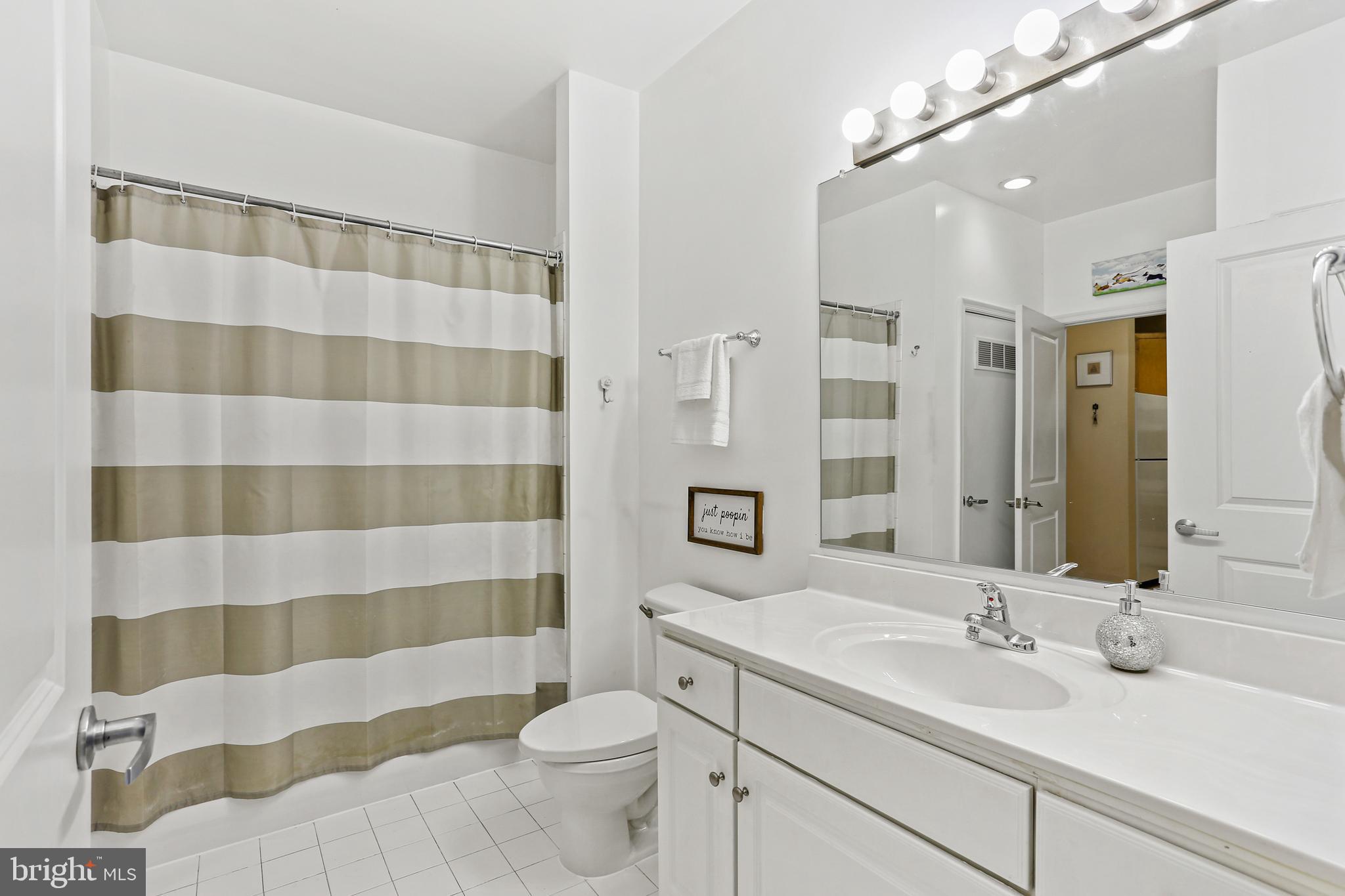 8045 Newell Street, Unit 223 Silver Spring, MD 20910 - Photo 18 of 25 Full Bath with Tub-Shower Combination