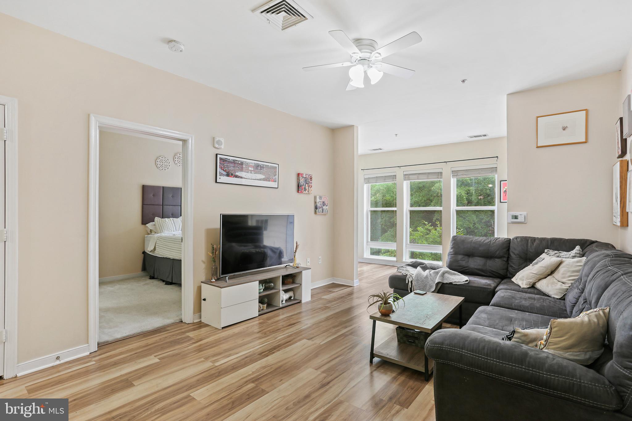 8045 Newell Street, Unit 223 Silver Spring, MD 20910 - Photo 6 of 25 Living Room with Hardwood Flooring