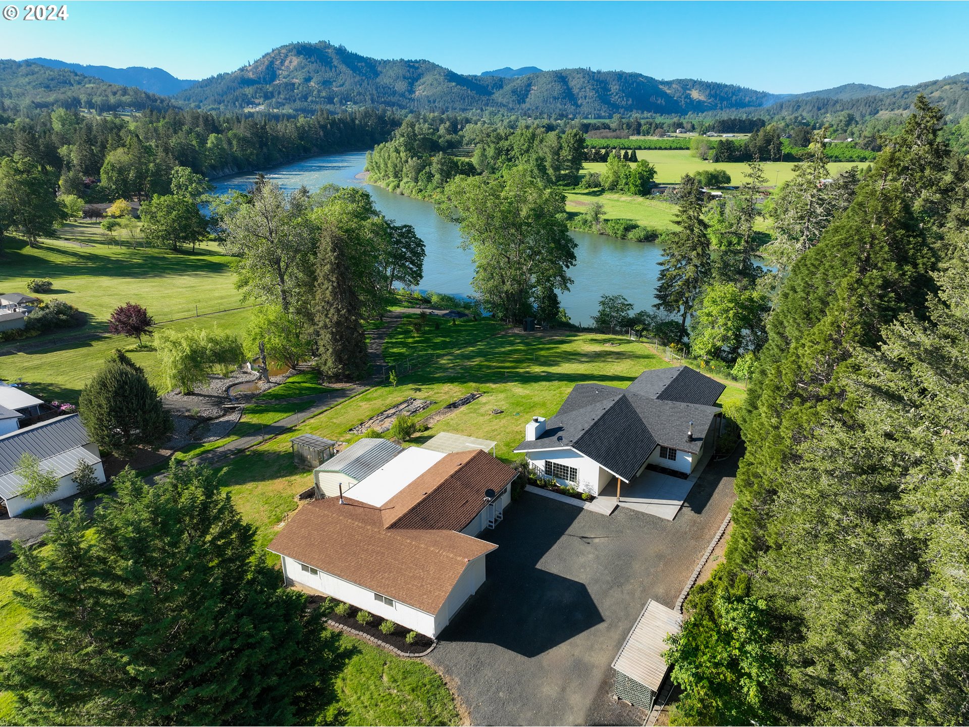 an aerial view of a house with a garden