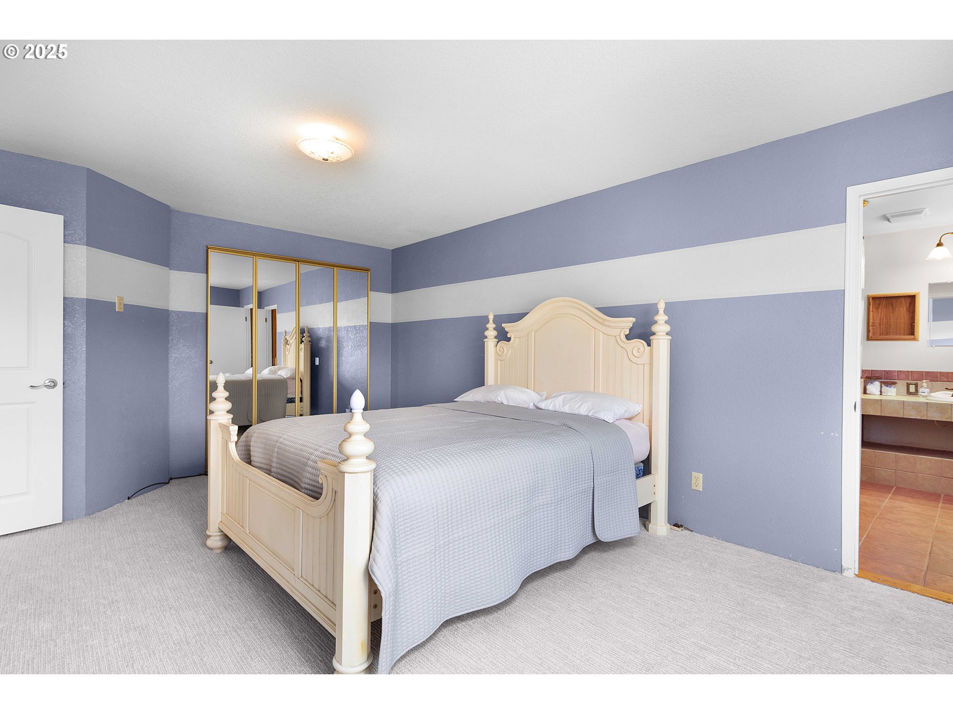 3993 Melqua Road Roseburg, OR 97471 - Photo 28 of 48 a bedroom with a bed and a refrigerator