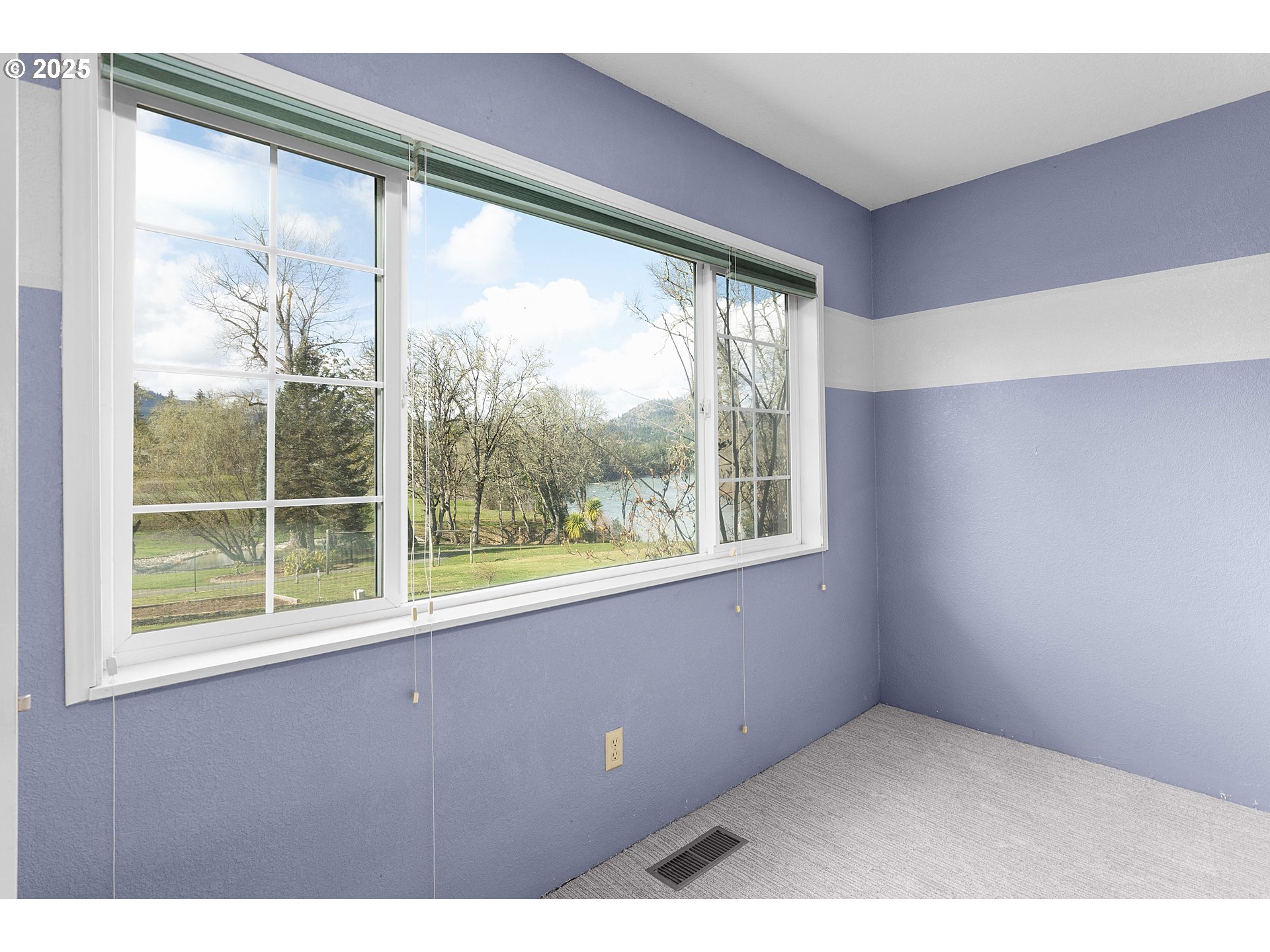 3993 Melqua Road Roseburg, OR 97471 - Photo 29 of 48 a view of an empty room with a window