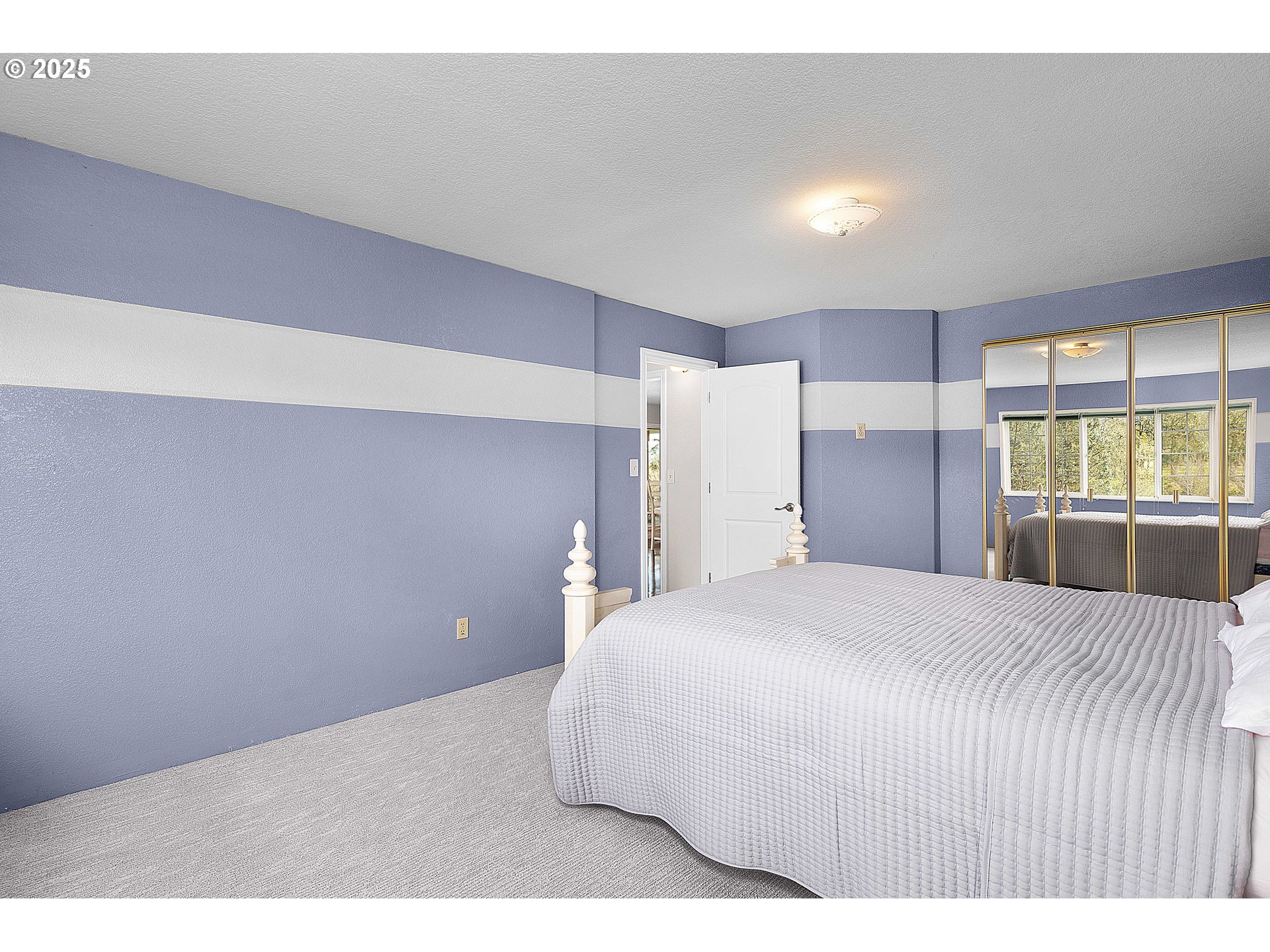 3993 Melqua Road Roseburg, OR 97471 - Photo 30 of 48 a bedroom with a bed and a large window