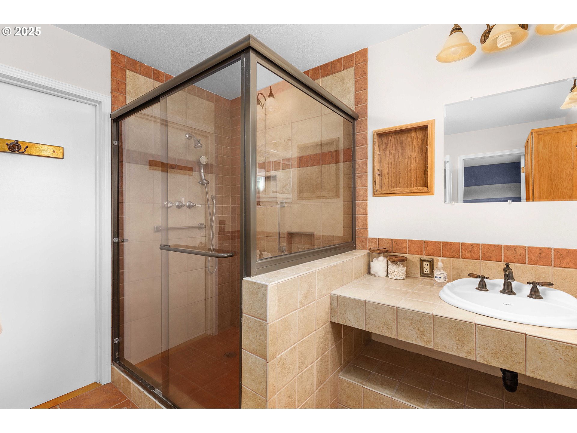3993 Melqua Road Roseburg, OR 97471 - Photo 32 of 48 a bathroom with a sink and a mirror