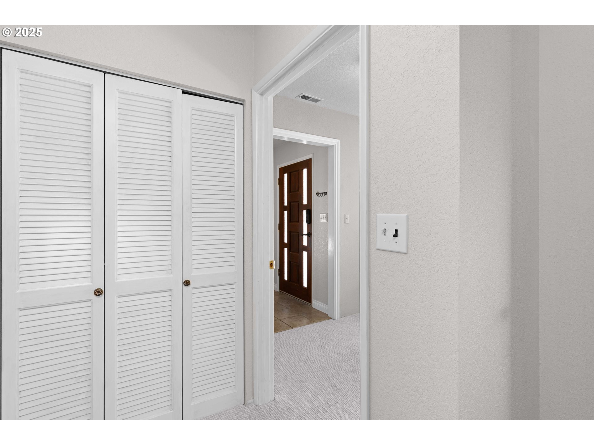 3993 Melqua Road Roseburg, OR 97471 - Photo 34 of 48 a view of a hallway with wooden shelves