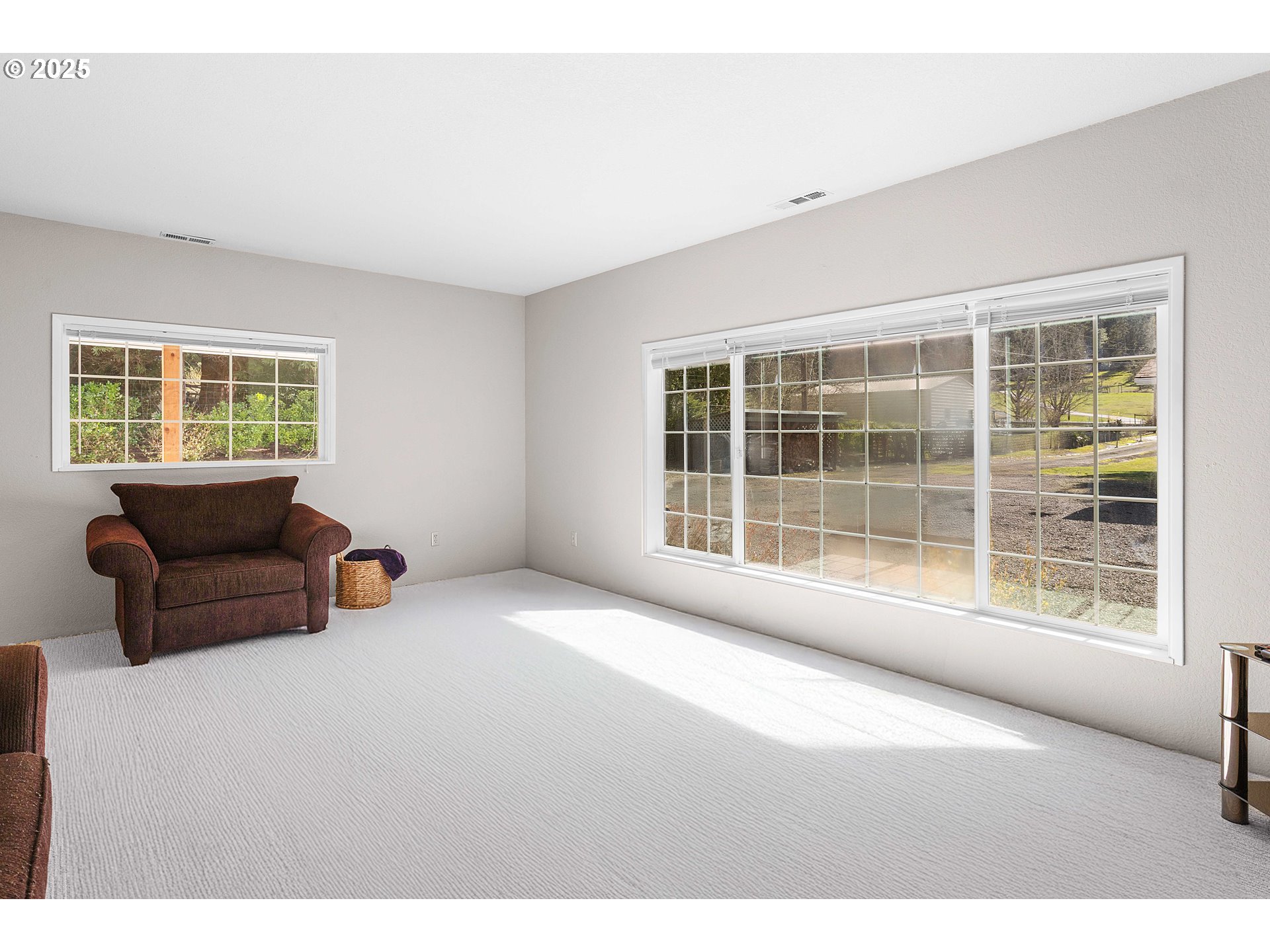 3993 Melqua Road Roseburg, OR 97471 - Photo 38 of 48 a living room with furniture and windows