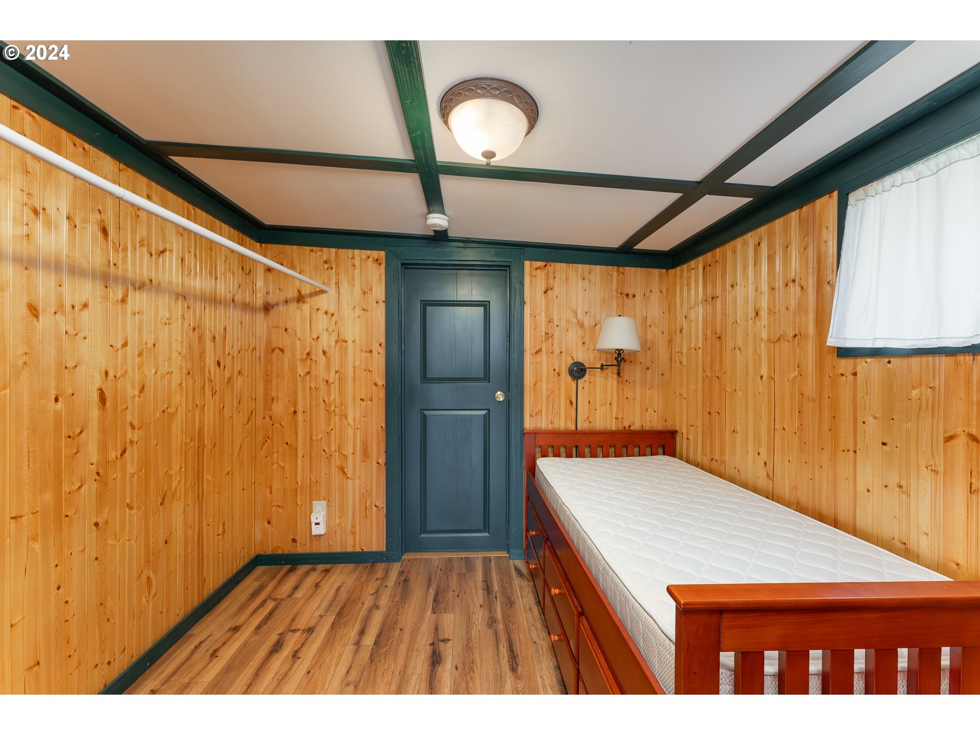 3993 Melqua Road Roseburg, OR 97471 - Photo 46 of 48 a kitchen with a wooden floor and a sink