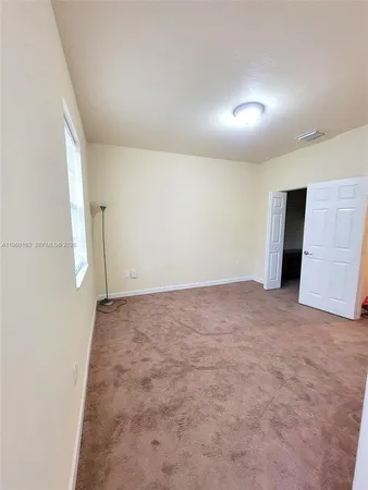 an empty room with a natural light