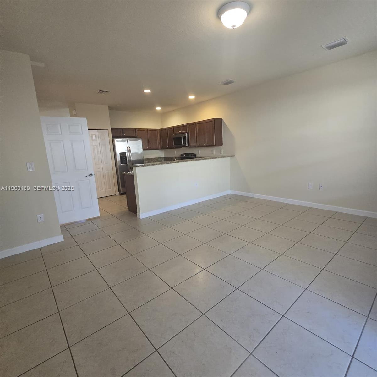 9031 Southwest 227th Street, Unit 5 Cutler Bay, FL 33190 - Photo 5 of 21 a view of a electric appliances in a room
