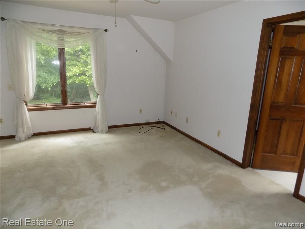 4650 Clyde Road Holly, MI 48442 - Photo 43 of 68 Master suite bedroom area