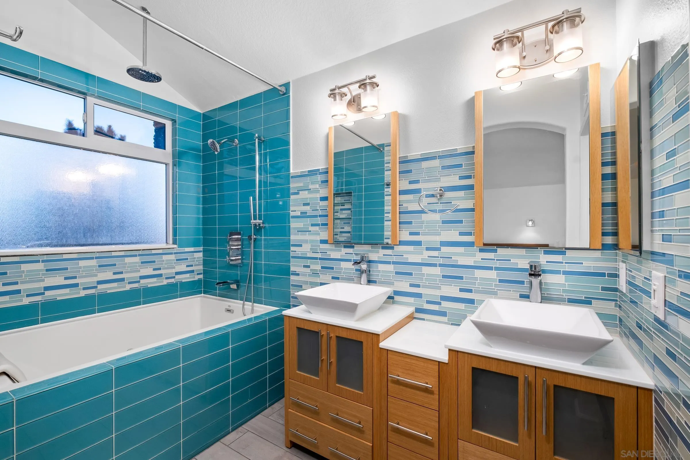 536 Kiley Road Chula Vista, CA 91910 - Photo 14 of 46 a bathroom with a sink and a mirror