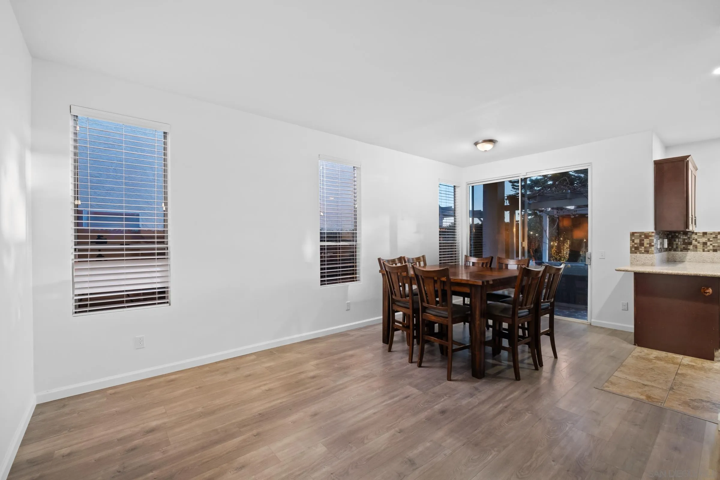 536 Kiley Road Chula Vista, CA 91910 - Photo 18 of 46 a view of a dining room with furniture and chandelier