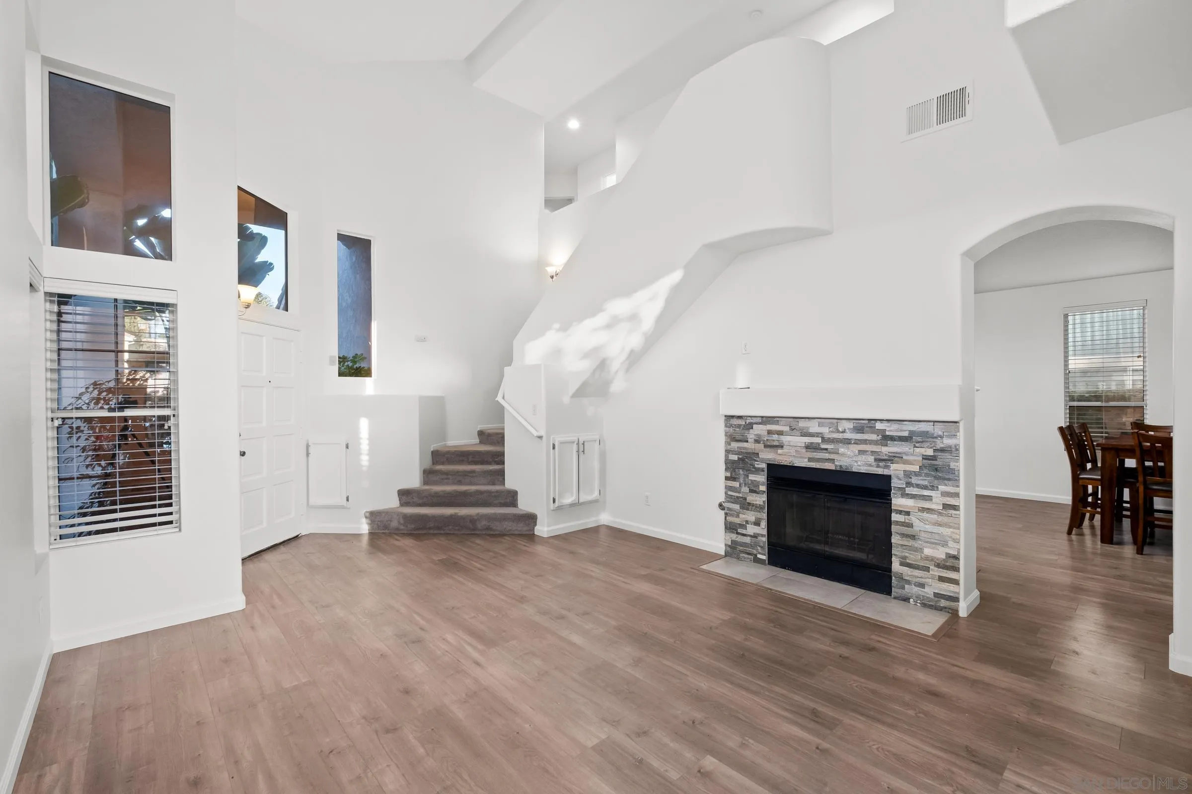 536 Kiley Road Chula Vista, CA 91910 - Photo 22 of 46 a view of a livingroom with a fireplace and wooden floor