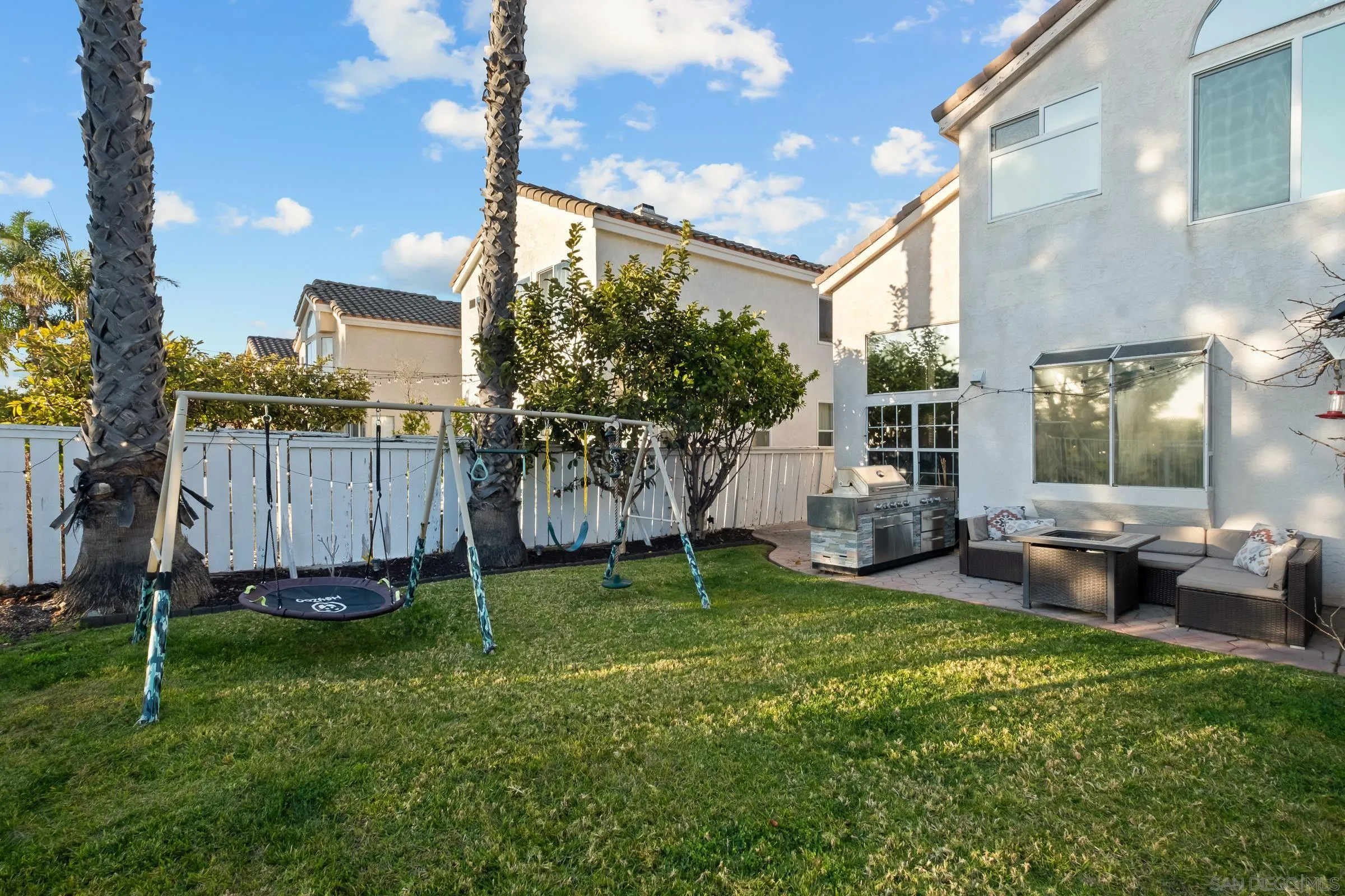 536 Kiley Road Chula Vista, CA 91910 - Photo 38 of 46 a backyard of a house with lots of green space