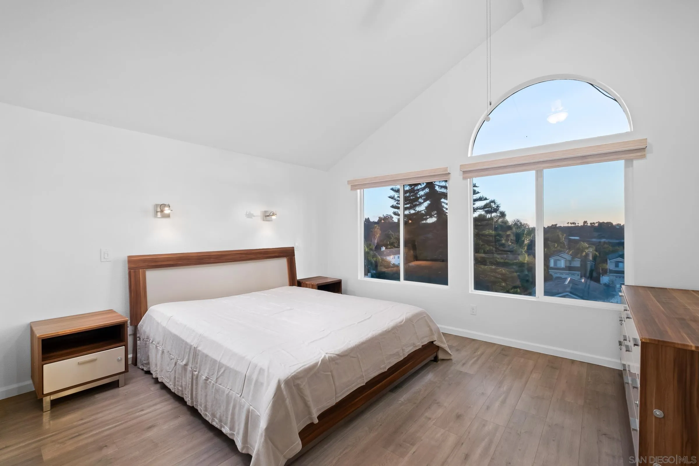 536 Kiley Road Chula Vista, CA 91910 - Photo 9 of 46 a bedroom with a bed and a large window