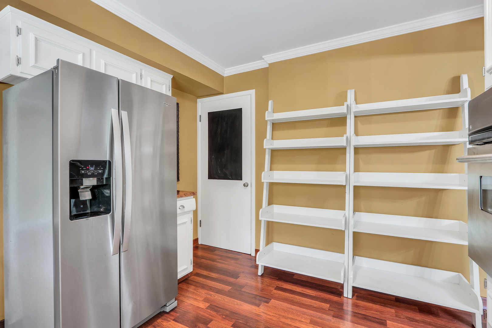 219 East Rockland Road Libertyville, IL 60048 - Photo 11 of 23 a view of walk in closet with empty racks