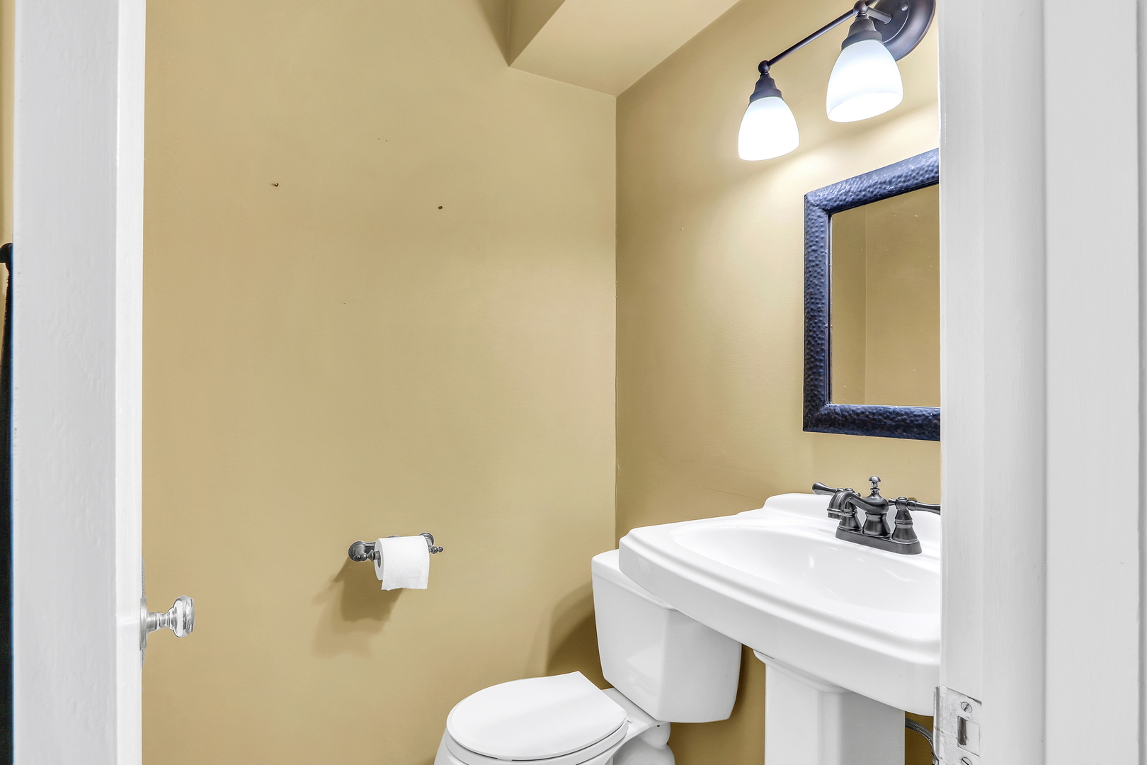 219 East Rockland Road Libertyville, IL 60048 - Photo 14 of 23 a bathroom with a sink and a toilet