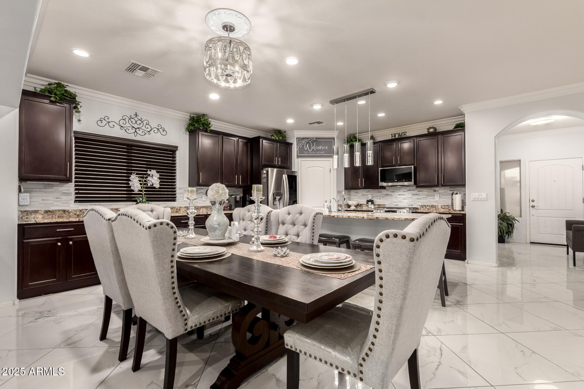 6641 West Georgetown Way Florence, AZ 85132 - Photo 11 of 35 a view of a dining room with furniture