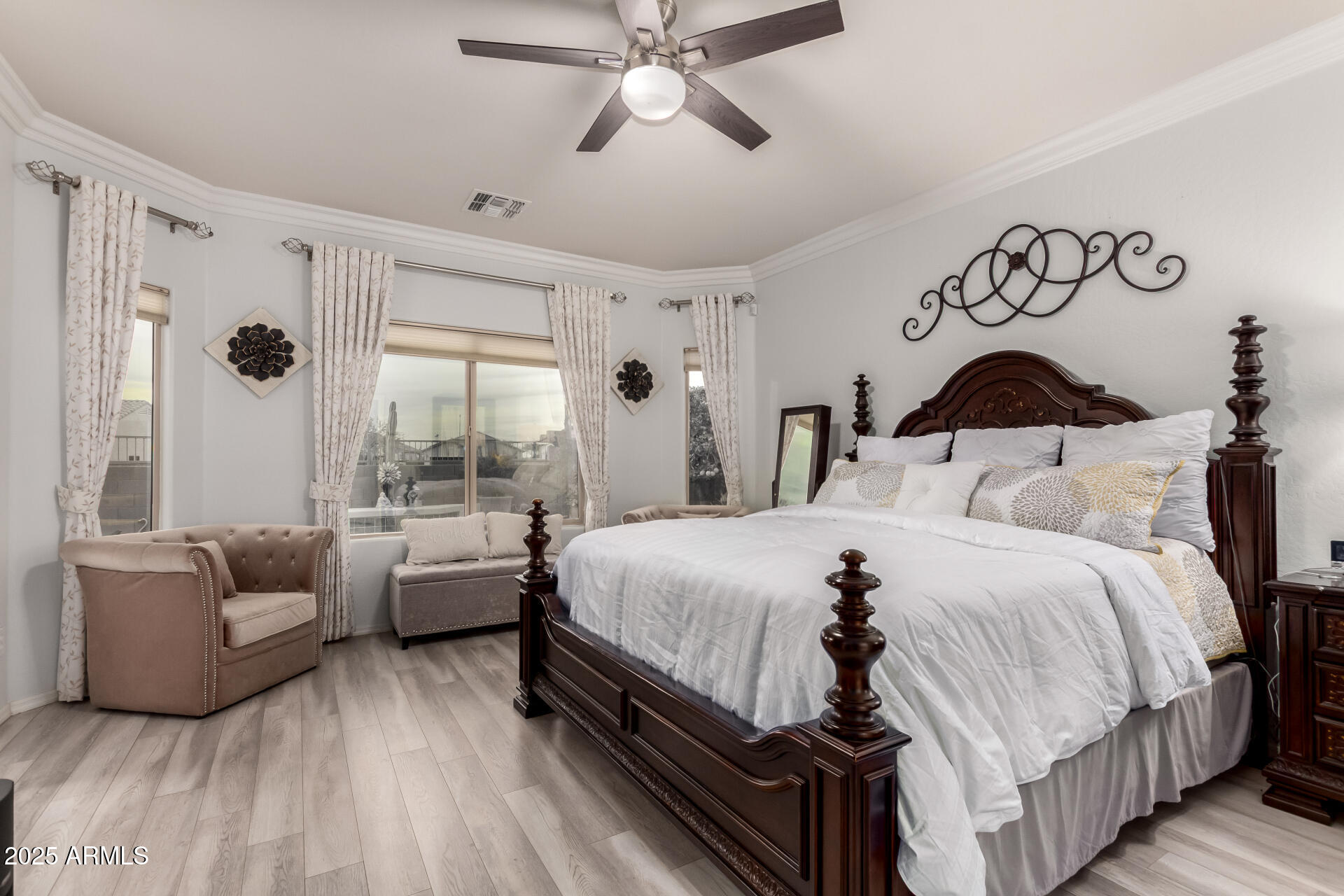 6641 West Georgetown Way Florence, AZ 85132 - Photo 15 of 35 a bedroom with a bed and a couch