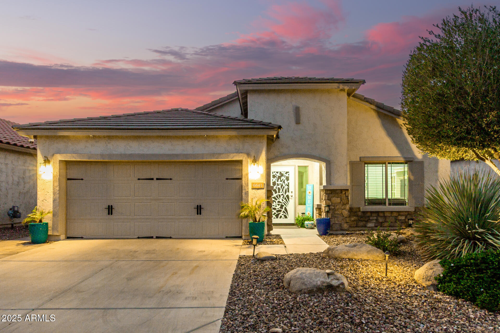 6641 West Georgetown Way Florence, AZ 85132 - Photo 2 of 35 a front view of a house