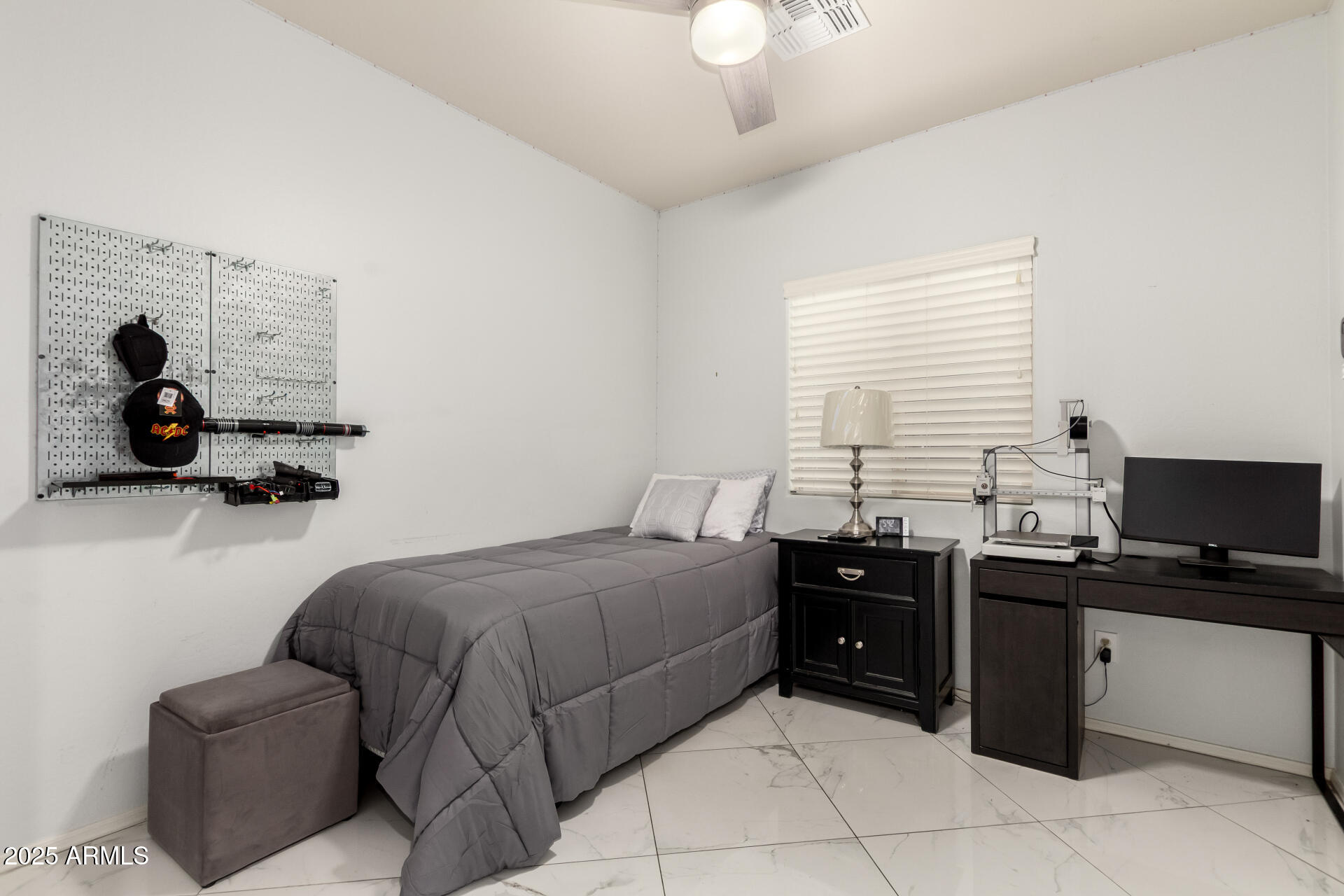 6641 West Georgetown Way Florence, AZ 85132 - Photo 21 of 35 a bedroom with a bed and a computer on the desk