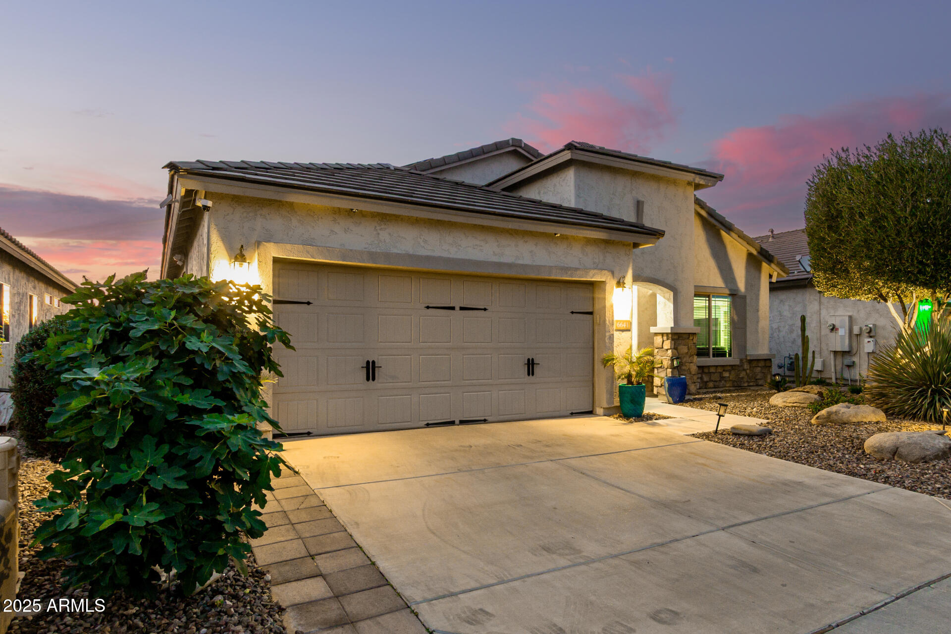 6641 West Georgetown Way Florence, AZ 85132 - Photo 3 of 35 a yellow house with tree in front of it